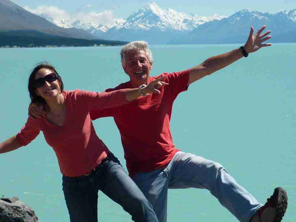 Photo of Sarah Tuckett Somatic Psychotherapy with her late father in New Zealand in front of Lake Tekapo